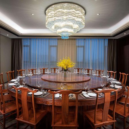 รามาดา วินด์แฮม เจิ้งโจว ซินเจิ้ง Hotel Xinzheng  ภายนอก รูปภาพ