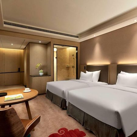 รามาดา วินด์แฮม เจิ้งโจว ซินเจิ้ง Hotel Xinzheng  ภายนอก รูปภาพ